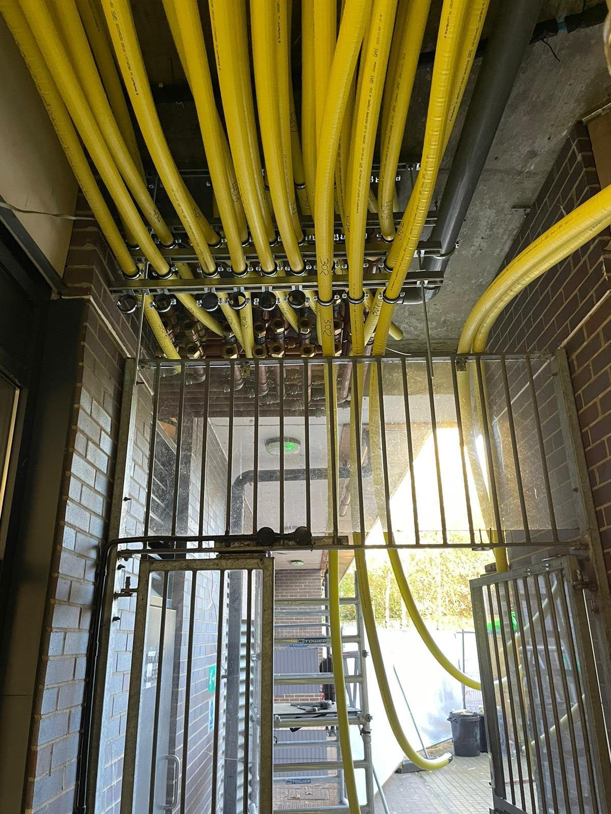 Milo and Diagoras Houses, Bow, East London. 66 New Gas Mains Replaced