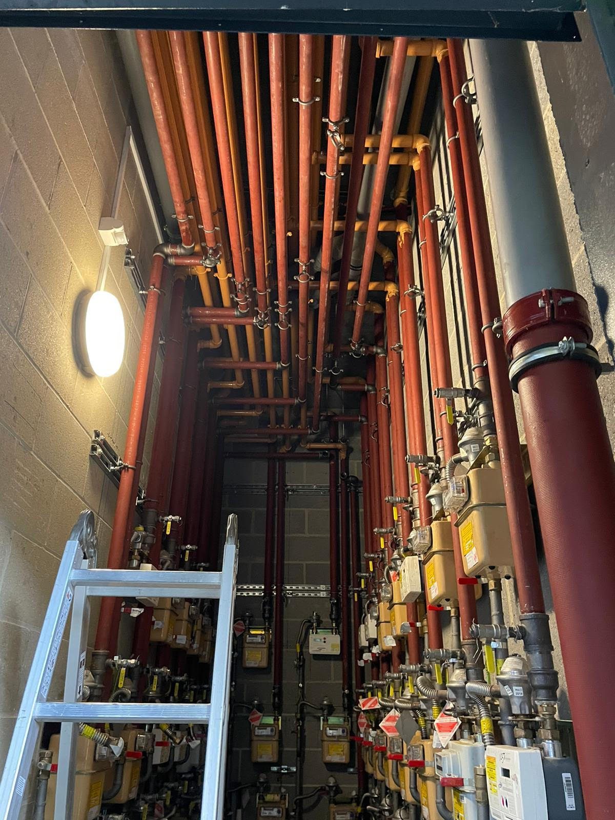 Milo and Diagoras Houses, Bow, East London. 66 New Gas Mains Replaced